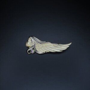 Vintage gold color pin with girl face and iridescent stone